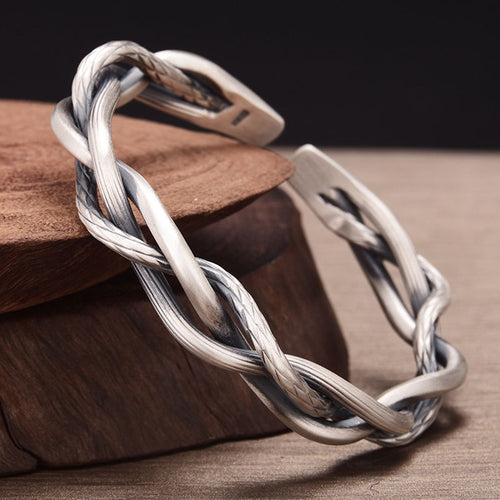 4. Silverarmband med tvinnad design – justerbar