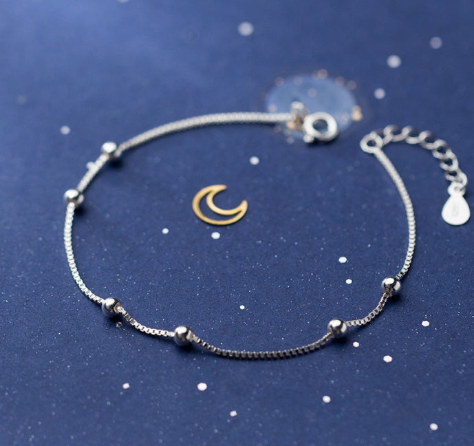 Armband i silver - inspirerat av universums omlopp