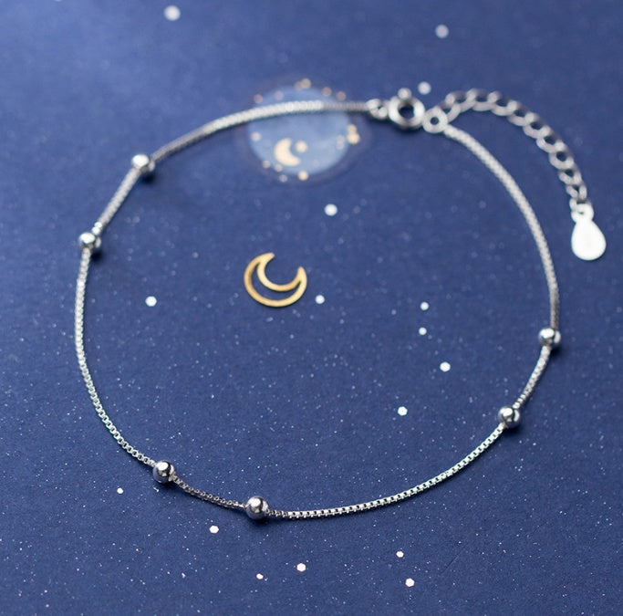 Armband i silver - inspirerat av universums omlopp