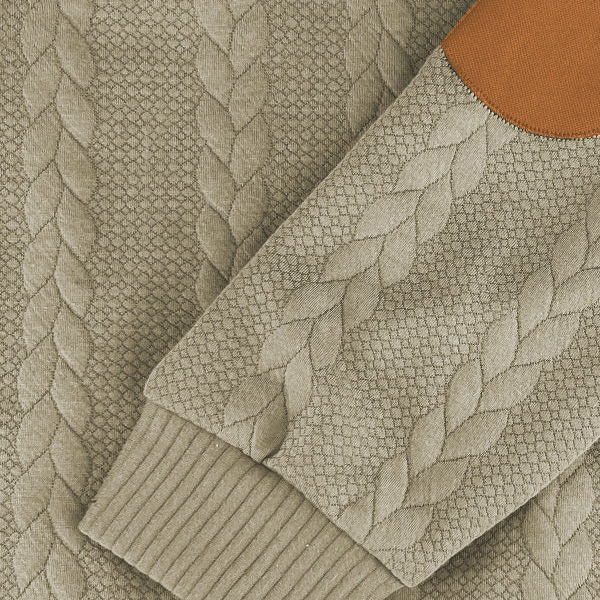 Elegant stickad tröja med jacquardmönster och broderade detaljer